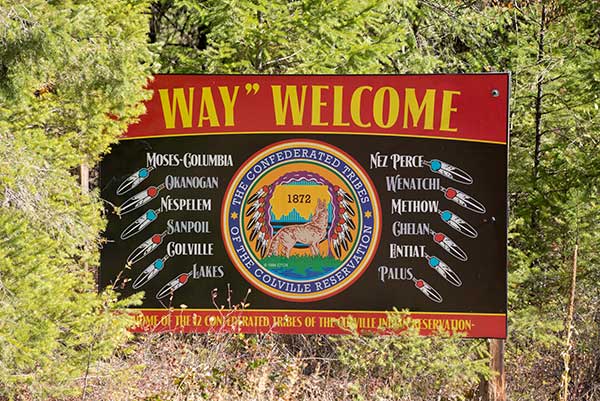 Sign welcoming visitors to the Colville Reservation